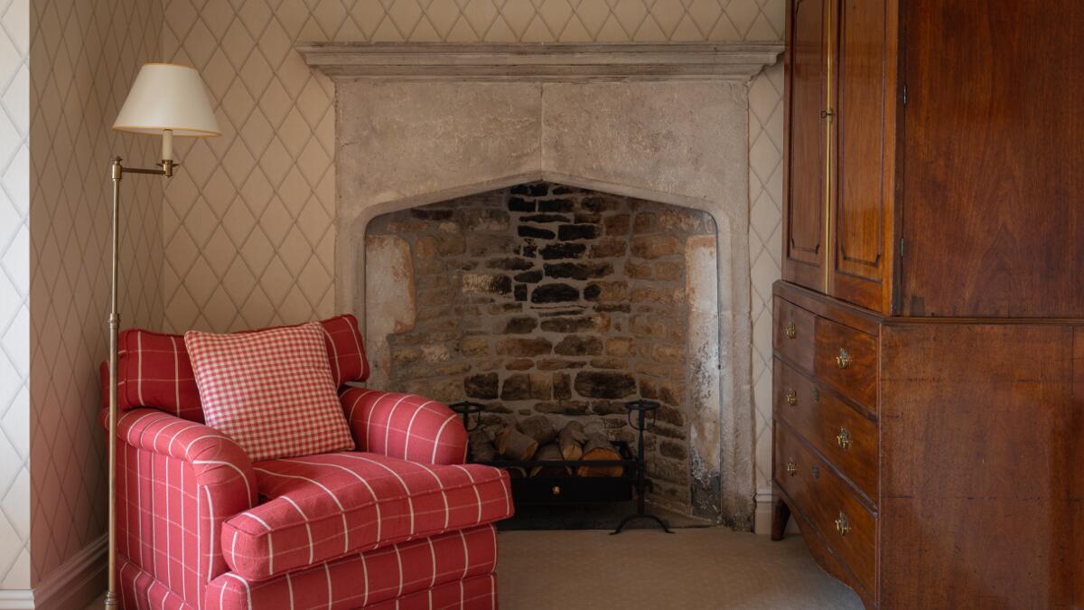 Yate room comfortable chair and feature fireplace