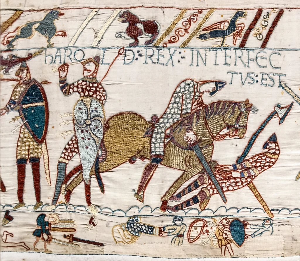 section of the Bayeux tapestry supposedly showing King Harold with an arrow through the eye